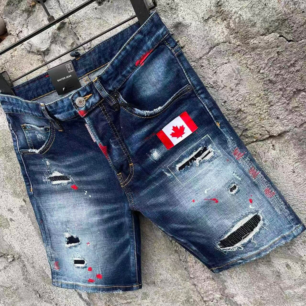 DISTRESSED PATCH DENIM SHORTS