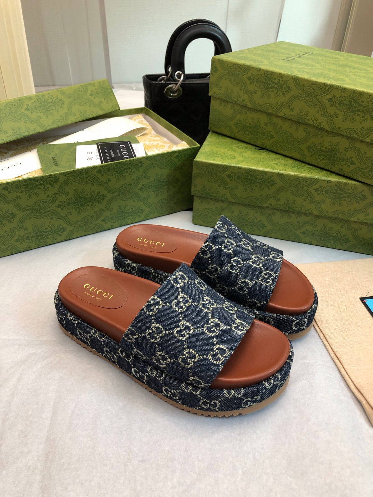 DENIM MONOGRAM PLATFORM SLIDES