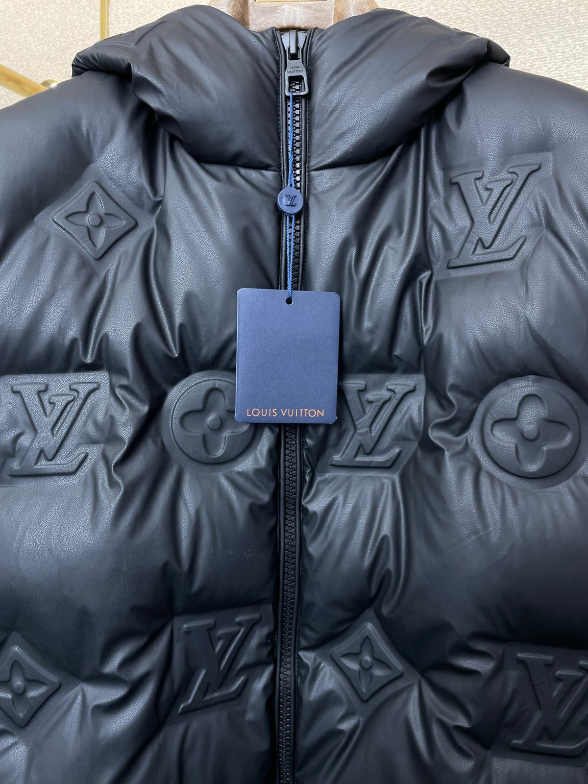 EMBOSSED PADDED HOODED VEST
