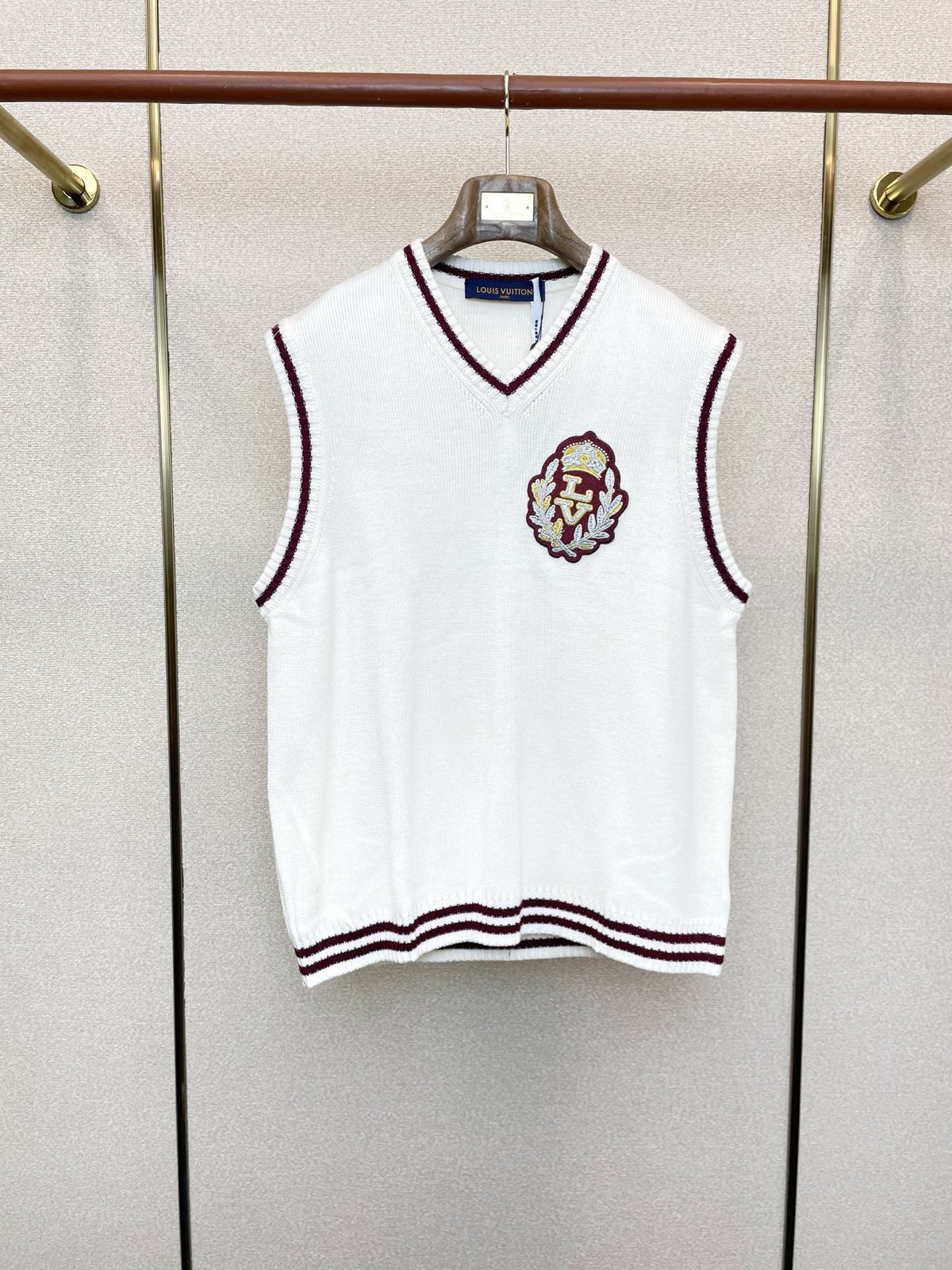 V-NECK KNIT VEST WITH EMBROIDERED CREST