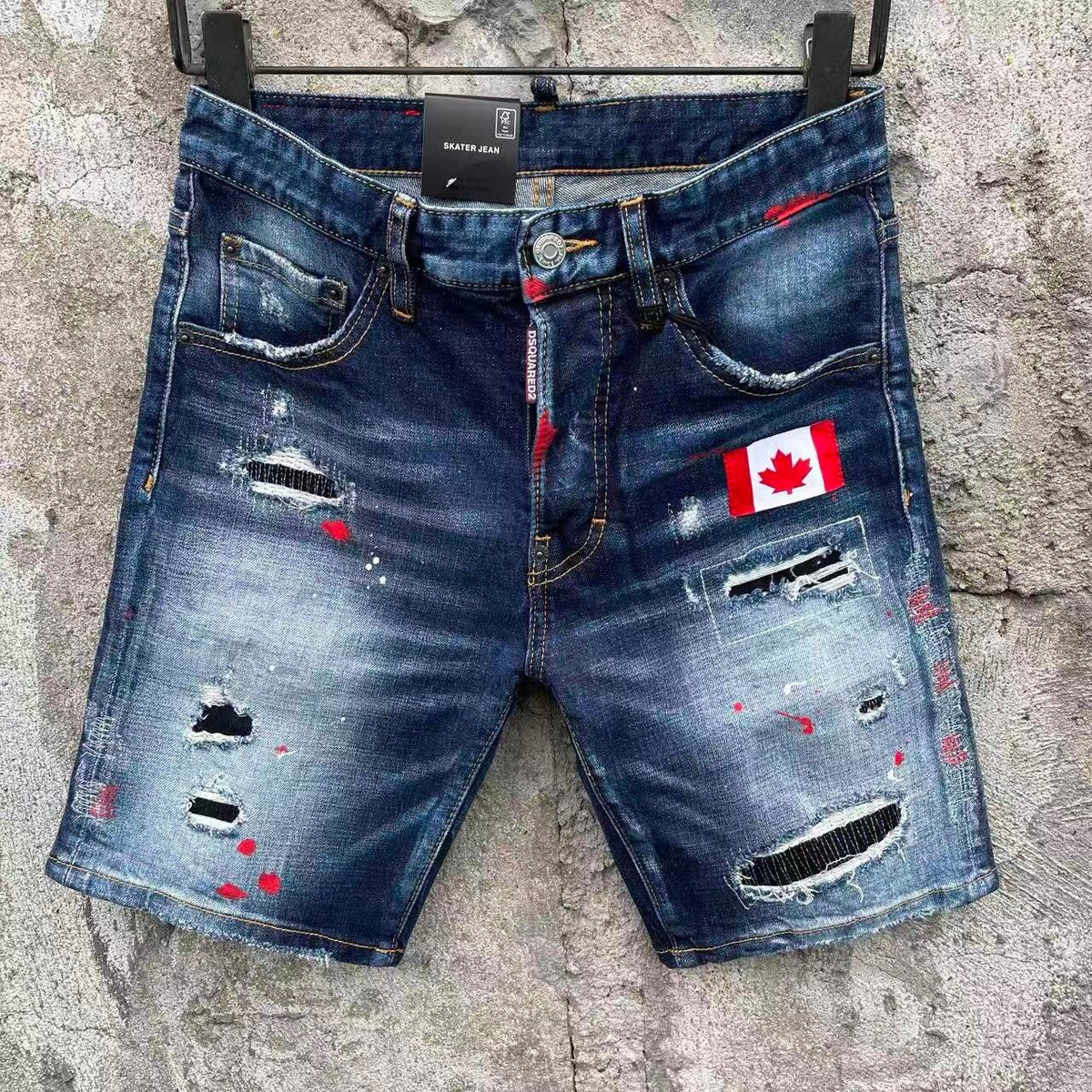 DISTRESSED PATCH DENIM SHORTS