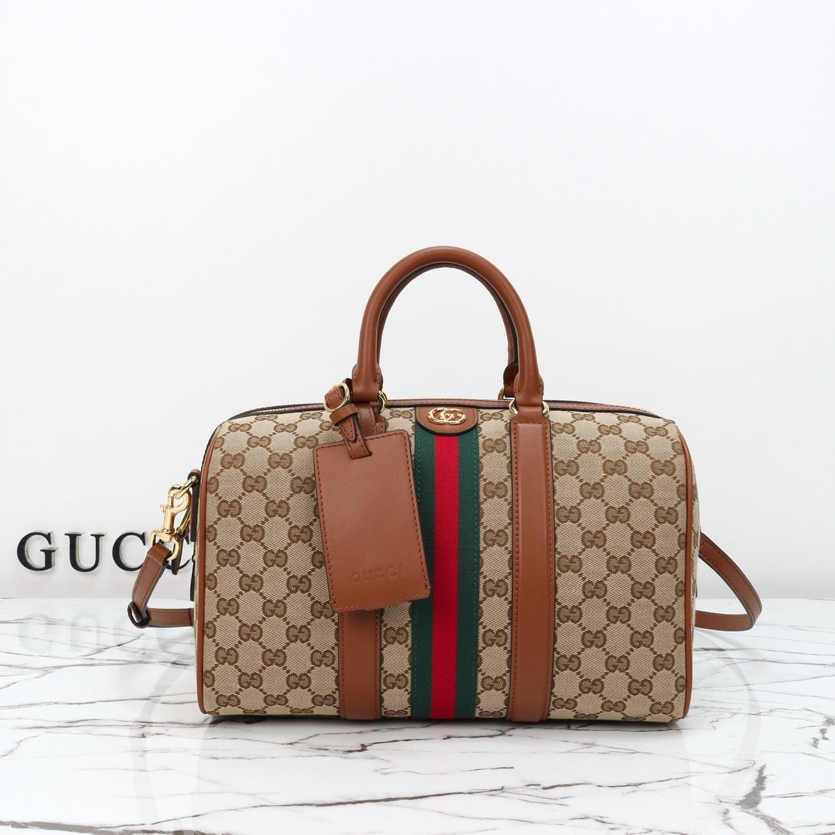 CANVAS DUFFLE-STYLE HANDBAG WITH WEB STRIPE