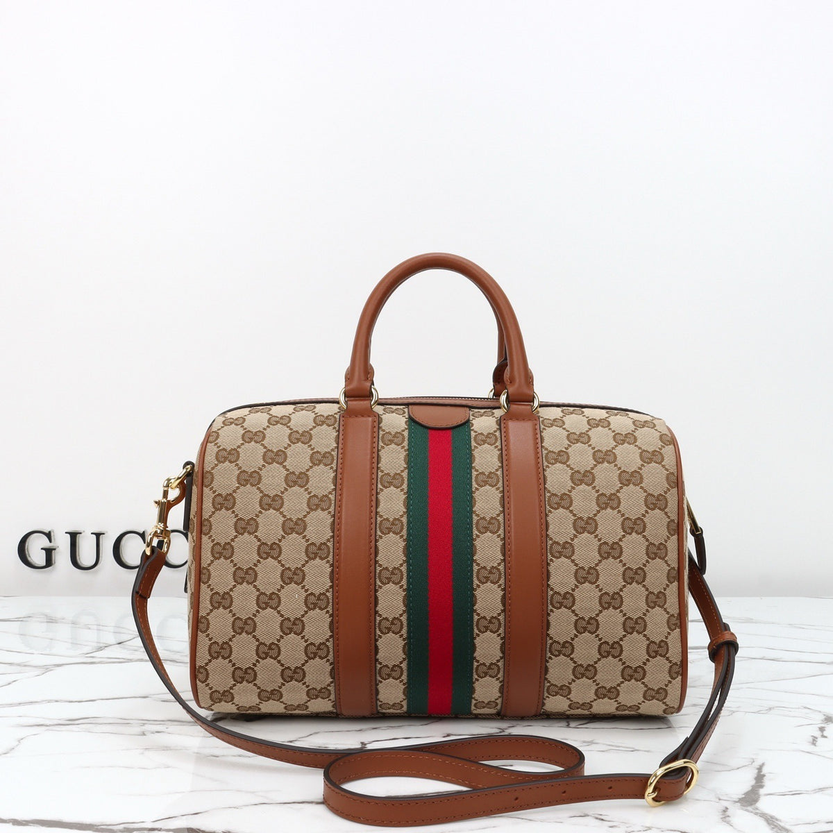 CANVAS DUFFLE-STYLE HANDBAG WITH WEB STRIPE
