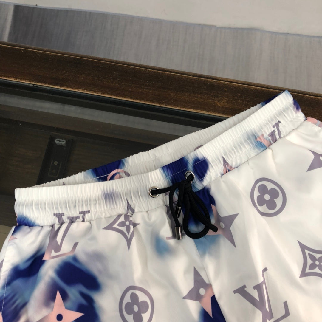 WHITE TIE-DYE PRINT SWIM SHORTS