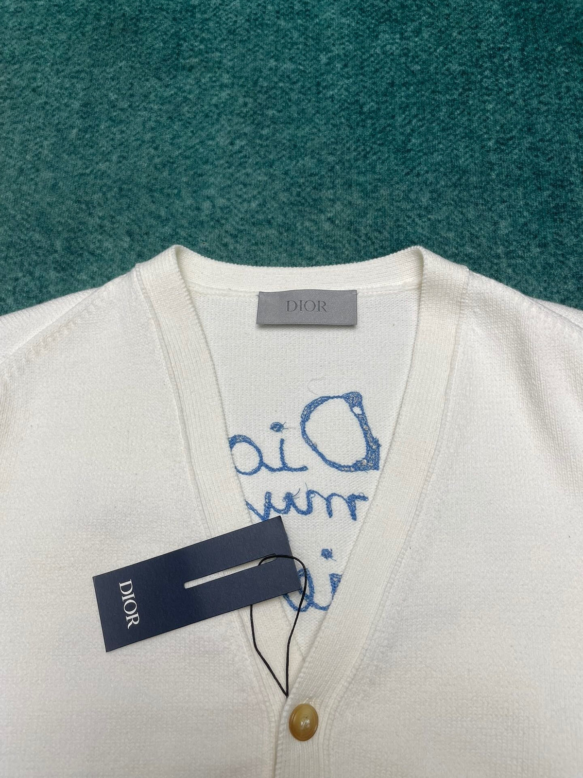 SCRIPT BACK PRINT KNIT SWEATER