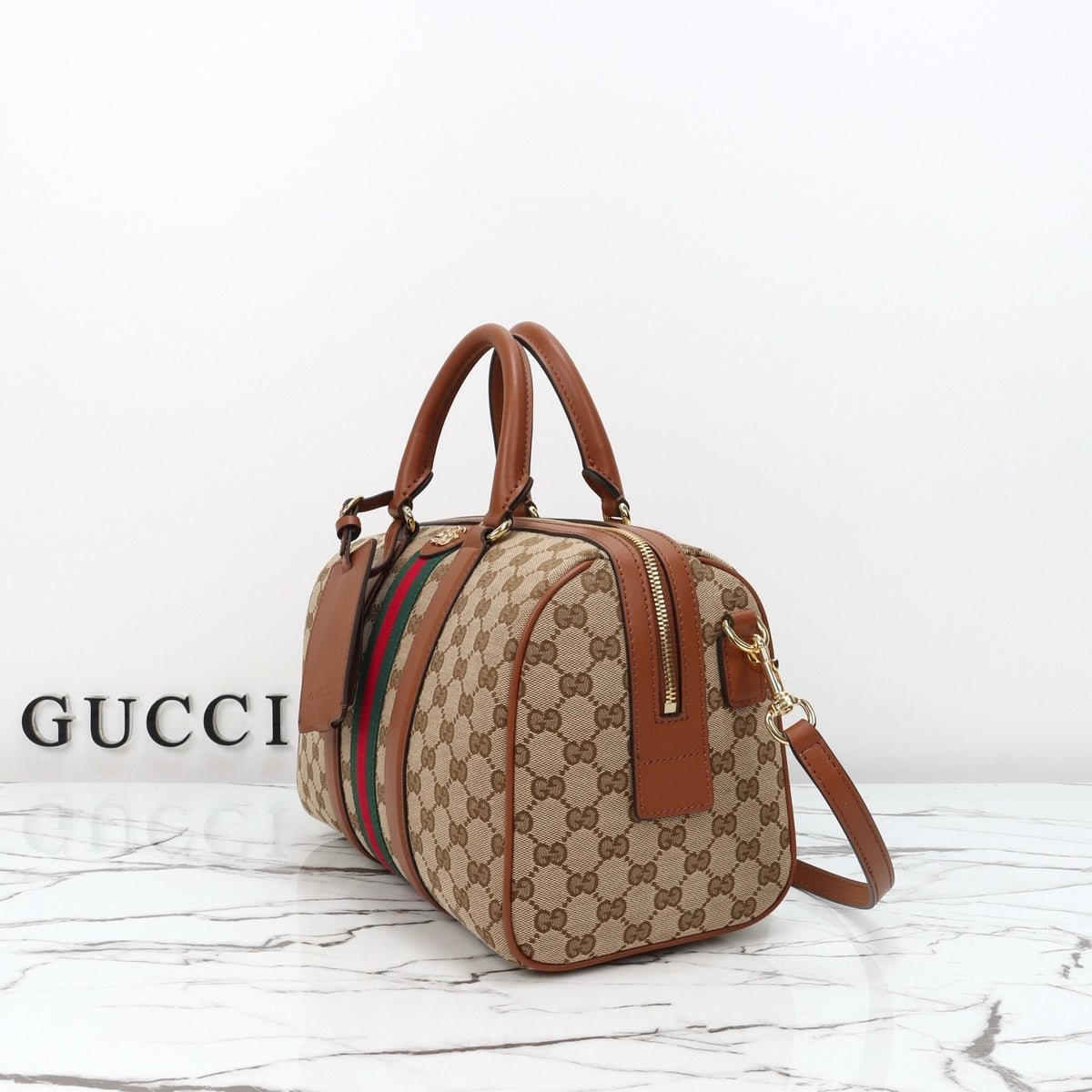 CANVAS DUFFLE-STYLE HANDBAG WITH WEB STRIPE