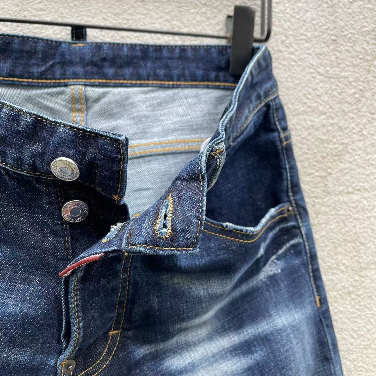 FADED DISTRESSED SLIM JEANS