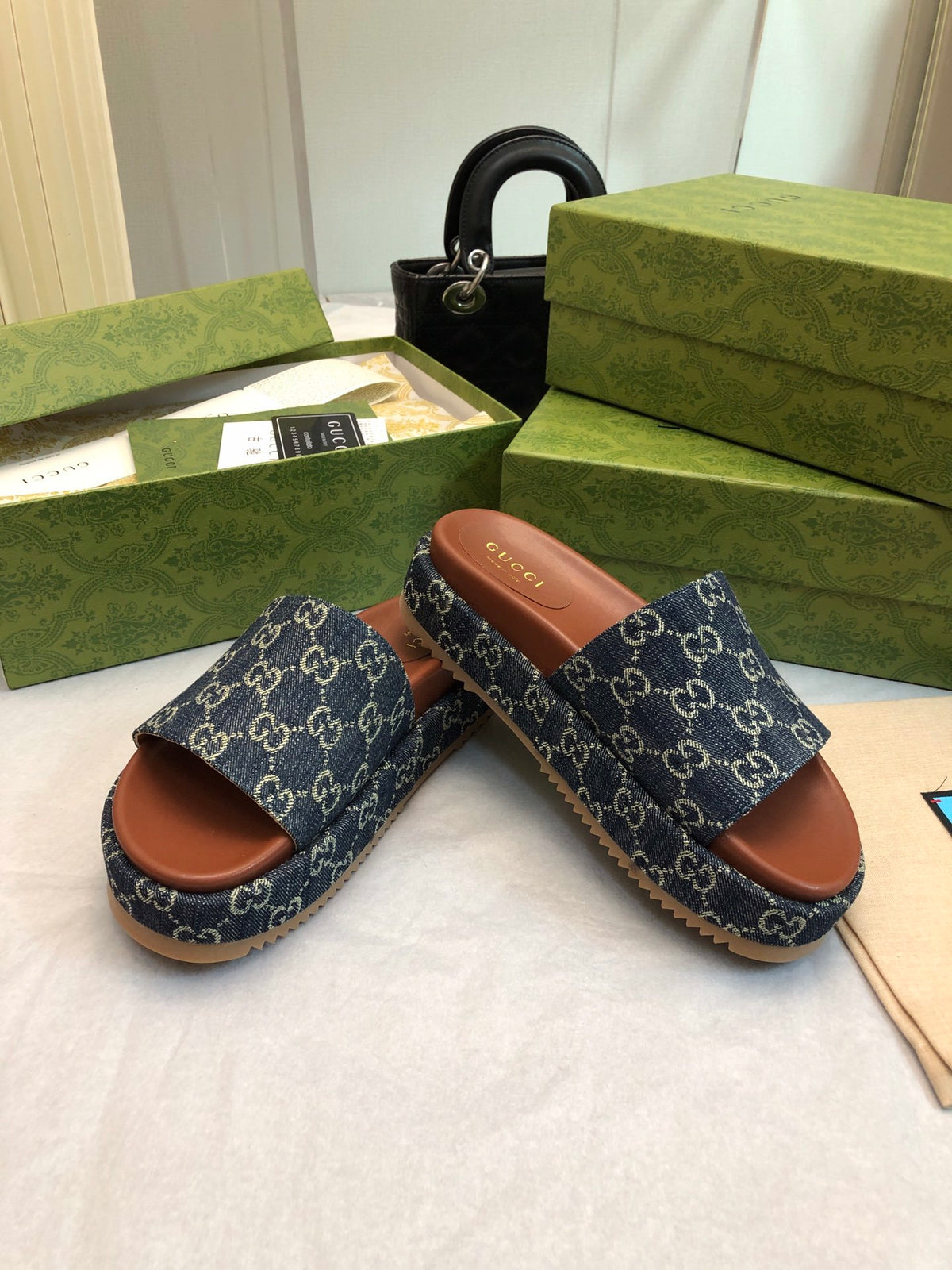 DENIM MONOGRAM PLATFORM SLIDES