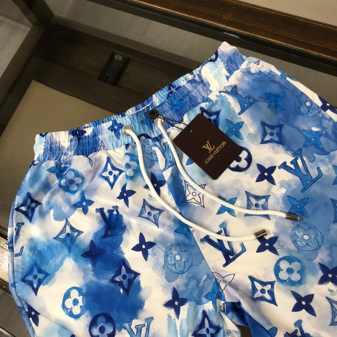 MONOGRAM SWIM SHORTS – BLUE TIE-DYE